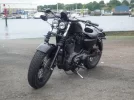 81710d1259957300-dual-headlights-on-a-nightster-2009_0804knucklebars0003.webp
