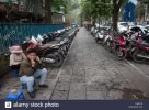 scooters-are-the-main-means-of-transport-in-vietnam-F0MC7E.webp